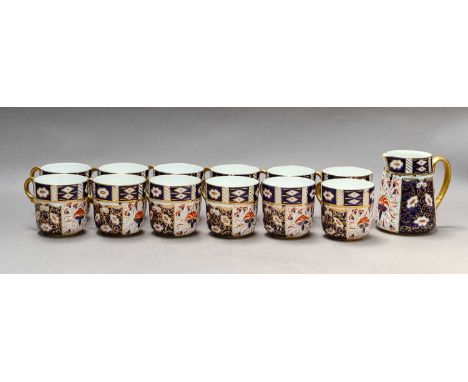 A porcelain part tea service in the Royal Crown Derby style in the Witches Japan pattern (one tray)Comprising: Two sandwich p