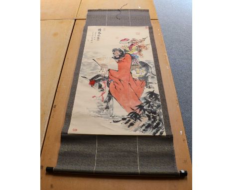 A large Chinese scroll; a Chinese mother-of-pearl inlaid galleried tray; a pair of moulded plaster on wood panels (4)