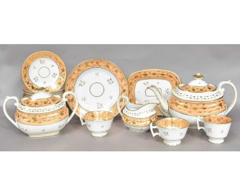 A Regency porcelain tea and coffee service with salmon ground gilt borders, comprising: teapot and stand, sucrier, milk jug, 