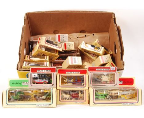 A collection of approximately 30+ original vintage boxed Lledo ' Days Gone ' diecast scale model vehicles and horse driven ca