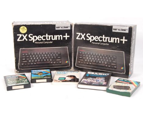 Two original vintage boxed Sinclair ZX Spectrum ' Personal Computer ' games consoles. One appears complete with power cable a