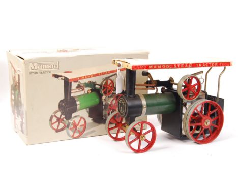 An original vintage Mamod made live steam traction engine / tractor. Green, with red wheels. Canopy to top. Appears complete,