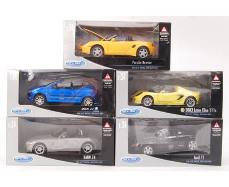 A collection of original boxed Welly precision diecast 1:24 scale model sports cars to include: Porsche Boxster , Peugeot 206