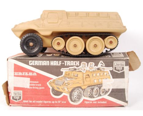 A vintage original Cherilea Toys made Action Man German Half Track military armoured vehicle within the original box having b