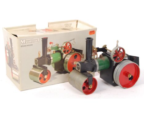 An original vintage Mamod made live steam traction engine ' SR1a '. Green, with red wheels. Fire box present. Within the orig