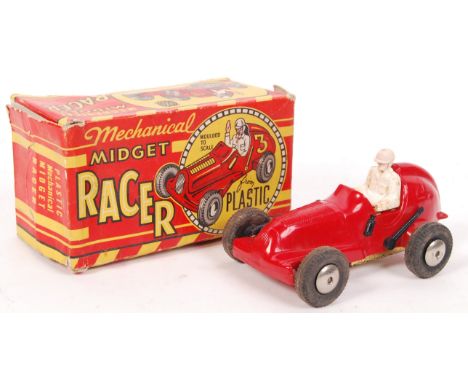 An original vintage Marx Toys made ' Mechanical Midget Racer ' plastic clockwork racing car. Red, complete with driver. Withi