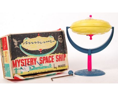 An original vintage Marx Toys made ' Mystery Space Ship ' toy. Gyroscope within. Within the original box, with instructions p