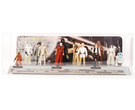 A beautiful rare vintage Star Wars First 12 action figure ' Action Display Stand ' complete with the full set of original fig