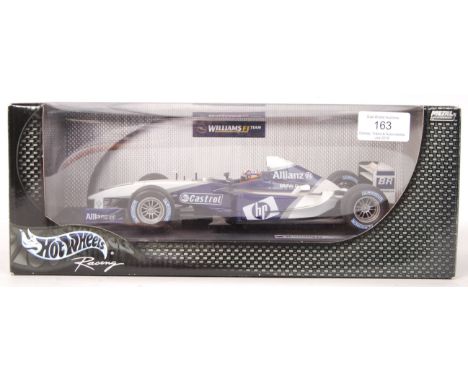 A Hot Wheels Racing made precision diecast 1:18 scale model Williams Formula One / F1 racing car Metal Collection ' BMW FW25 