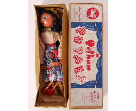 A rare vintage early-issue Pelham Puppet ' Mexican Girl '. Complete, within the original early buff-coloured box with paper l