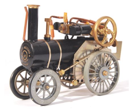 A superb German made ' Lutz Hielscher ' live steam traction engine. Brilliantly engineered, in steel and brass. Appears compl