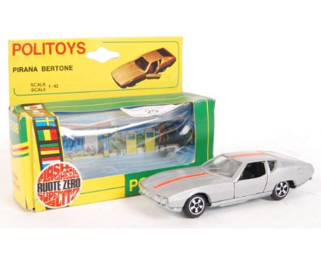 A vintage Politoys made Italian 1:43 scale diecast model Pirana Bertone No. 588. Model appears very near mint, within the ori