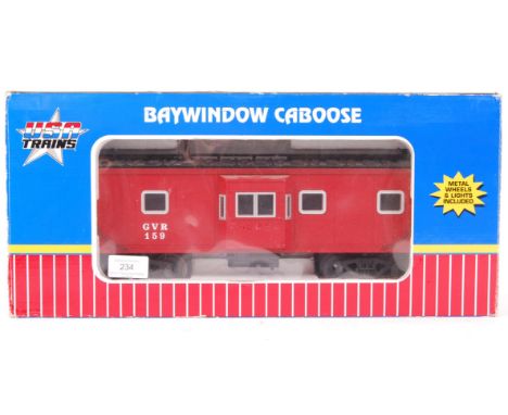 A USA Trains made G scale model railway trainset carriage / caboose ' Baywindow Caboose '. GVR 159. Red. Within the original 