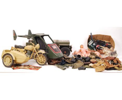 A good large collection of assorted original vintage Palitoy made ' Action Man ' clothing, weapons , vehicles and accessories