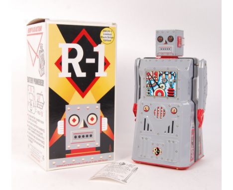 A rare ' Rocket USA ' made limited edition ' R-1 ' battery operated tinplate classic style robot. Appears mint and unused, wi