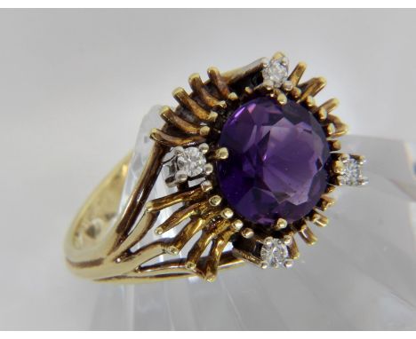 DAMENRING585/000 Gelbgold mit Amethyst und 4 kleinen Diamanten. Ringgr. 55. Brutto ca. 5,5g.   A LADIES RING 585/000 yellow g