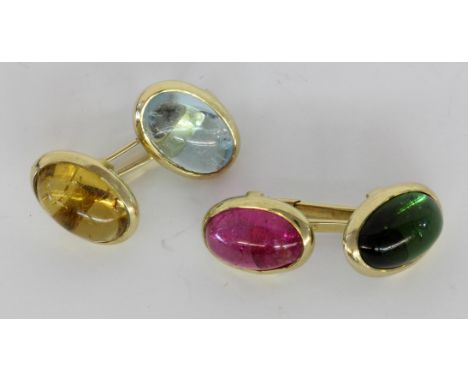 PAAR MANSCHETTENKNÖPFE585/000 Gelbgold mit diversen Edelsteinen.   A PAIR OF CUFFLINKS 585/000 yellow gold with various gemst
