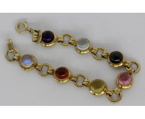 ARMBAND585/000 Gelbgold mit 7 diversen Edelsteinen. L.18,5cm.   A BRACELET 585/000 yellow gold with 7 different gemstones. 18