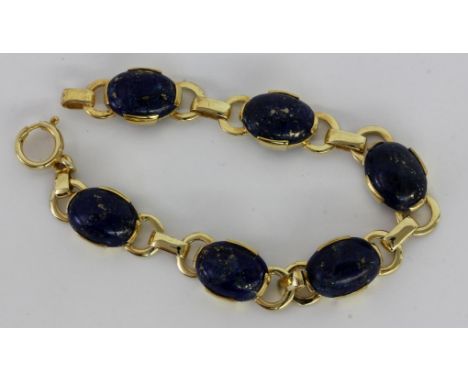 ARMBANDSilber vergoldet mit 6 Lapislazuli. L.18,5cm.   A BRACELET Silver, gold-plated with 6 lapis lazuli. 18.5 cm long. Keyw