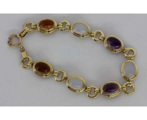 ARMBANDSilber vergoldet mit 7 diversen Edelsteinen. L.19cm.   A BRACELET Silver, gold-plated with 7 different gemstones. 19 c