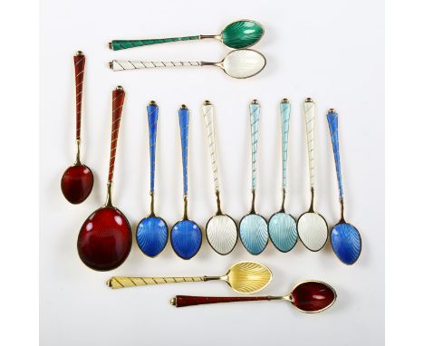 EGON LAURIDSEN - a set of 12 Danish vermeil sterling silver and harlequin enamel coffee spoons and matching preserve spoons, 