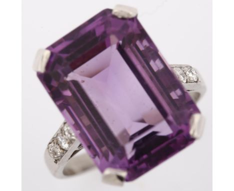 A late 20th century amethyst and diamond dress ring, unmarked white metal settings test as 18ct, set with large octagonal ste