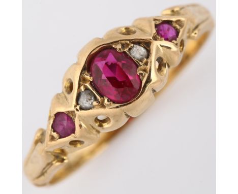 An early 20th century ruby and diamond dress ring, unmarked gold settings with oval mixed-cut ruby and rose-cut diamonds, set