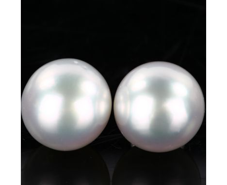 A pair of 18ct white gold whole pearl earrings, set with 13.8mm pearls and stud fittings, hallmarks London 1999, 10.2gNo dama