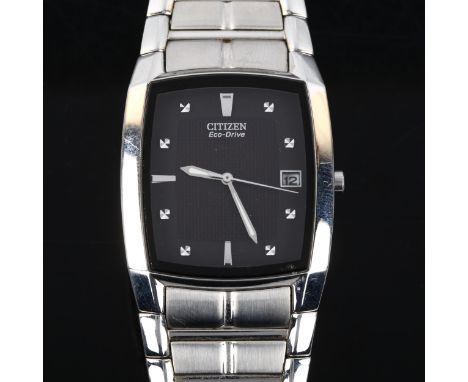CITIZEN - a stainless steel Eco-Drive quartz bracelet watch, ref. E111-3049385, black dial with steel hour markers, sweep cen