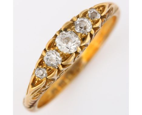 An early 20th century 18ct gold graduated five stone diamond half hoop ring, set with old European-cut diamonds, total diamon