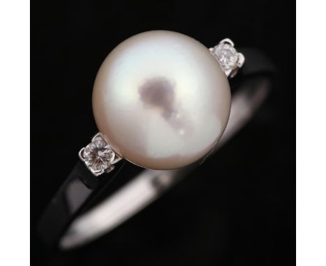 A 1970s 18ct white gold whole pearl and diamond dress ring, set with modern round brilliant-cut diamonds, possibly Swiss, pea