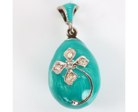 A miniature Continental sterling silver turquoise enamel and cubic zirconia egg pendant, with flower motif, pendant height 30