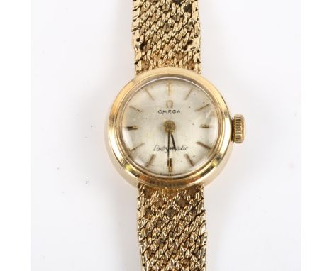 OMEGA - a lady's 9ct gold Ladymatic automatic bracelet watch, circa 1966, silvered dial with gilt baton hour markers and 9ct 