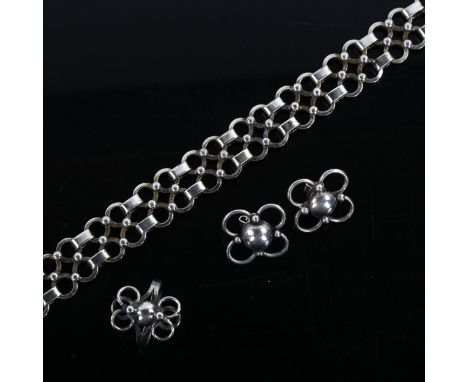 A group of similar Danish silver hoop jewellery, comprising bracelet, ring and pair of earrings, bracelet length 19cm, ring s
