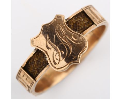 An Antique 9ct rose gold memorial band ring, with shield motif and woven hair shank, inscribed "In memory of", maker's marks 