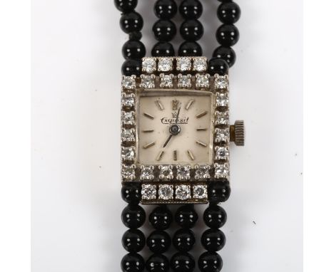 EXQUISIT - a lady's  18ct white gold diamond and jet mechanical cocktail bracelet watch, circa 1960s, silvered dial with stee