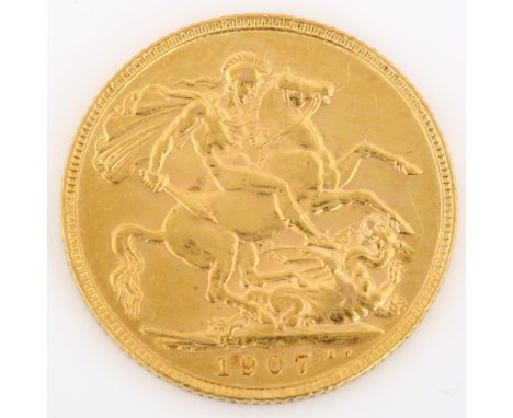 An Edward VII 1907 gold full sovereign coin, 7.9gLight surface abrasions and light wear to high points 