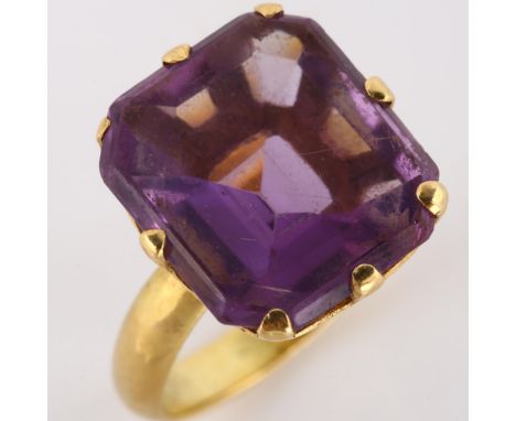 A late 20th century flat-top amethyst seal ring, unmarked yellow metal settings, setting height 17mm, size O, 7.3gNo damage o