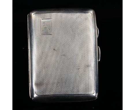 An Art Deco George VI curved silver cigarette case, allover engine turned decoration with gilt interior, by Joseph Gloster Lt