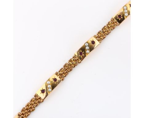 A Victorian gold plated garnet and pearl bracelet, maker's marks S and C, bracelet length 18.5cm, 15.9gNo damage or repair, n