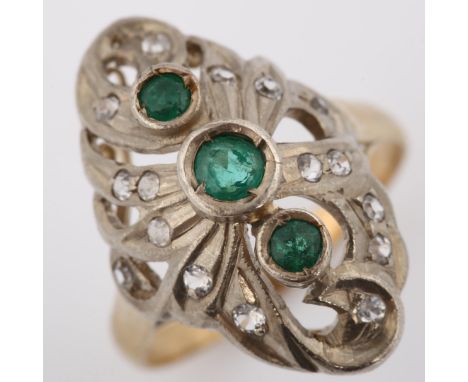 An emerald and white sapphire cocktail ring, unmarked gold and silver settings, setting height 21.2mm, size K, 3.5gNo damage 