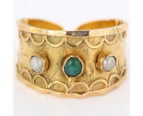 A French gold turquoise and pearl torque ring, with engraved band decoration, setting height 11.7mm, size M, 3.8gNo damage or