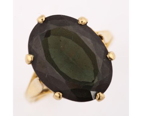 A late 20th century 9ct gold green quartz dress ring, hallmarks London 1971, setting height 17.2mm, size K, 4.5gNo damage or 