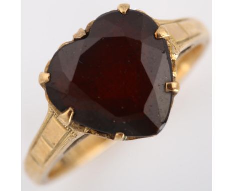 An Antique 9ct gold garnet heart dress ring, set with heart-cut garnet, setting height 10.3mm, size K, 2.9gNo damage or repai