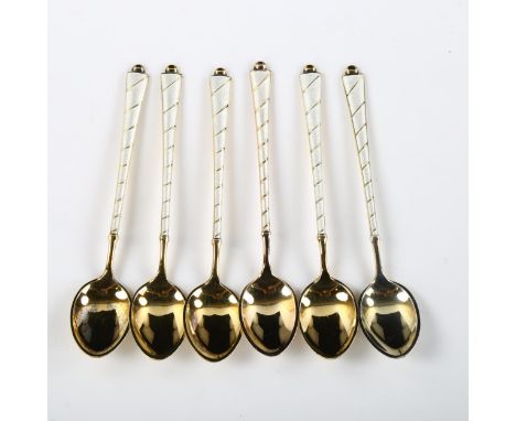 EGON LAURIDSEN - a set of 6 Danish vermeil sterling silver and white enamel coffee spoons, length 9.5cmNo damage or repair, n