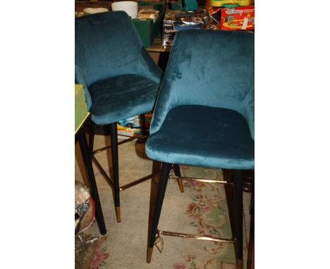 A PAIR OF MODERN UPHOLSTERED BUTTON BACK STOOLS