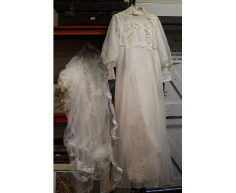 A VINTAGE WEDDING DRESS TOGETHER WITH A VINTAGE CHRISTENING GOWN