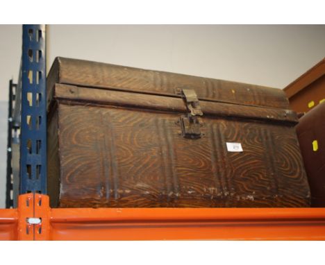 A VINTAGE TIN TRUNK