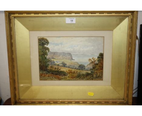 A GILT FRAMED AND GLAZED WATERCOLOUR OF A SEASCAPE SIGNED C L BANCFORT