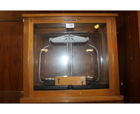 A CASED SET OF SCALES AND WEIGHTS BY GRIFFIN AND GEORGE LTD